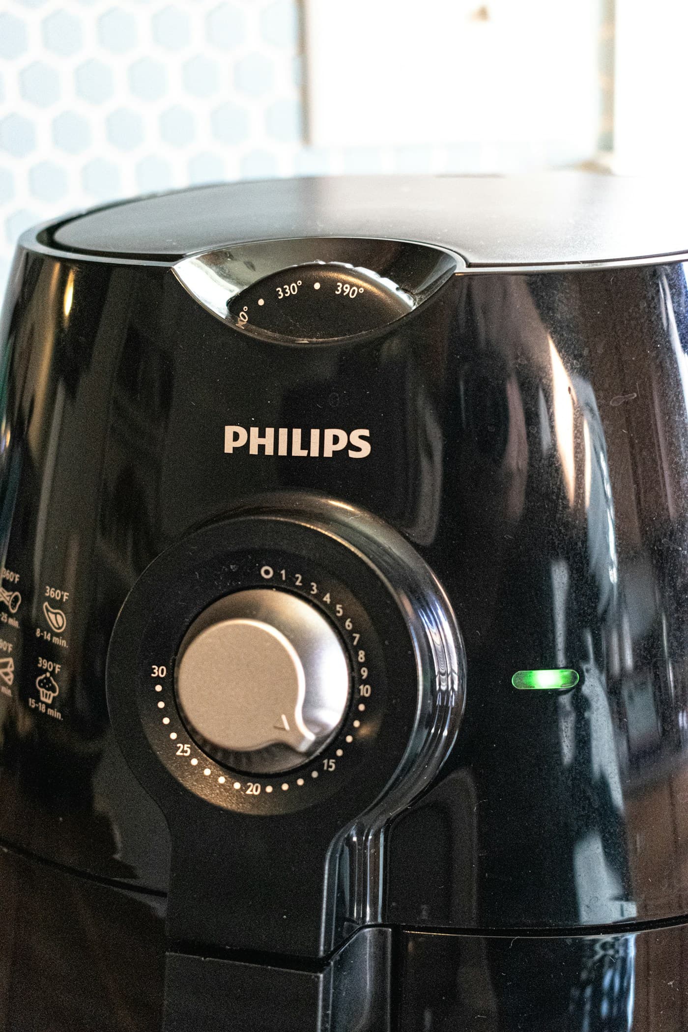 Black Philips air fryer with manual controls